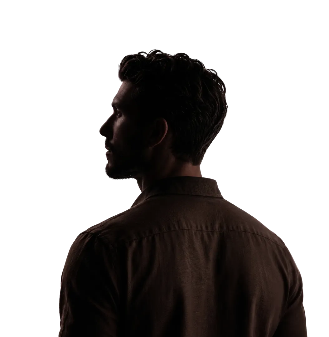 Man in profile on a dark background